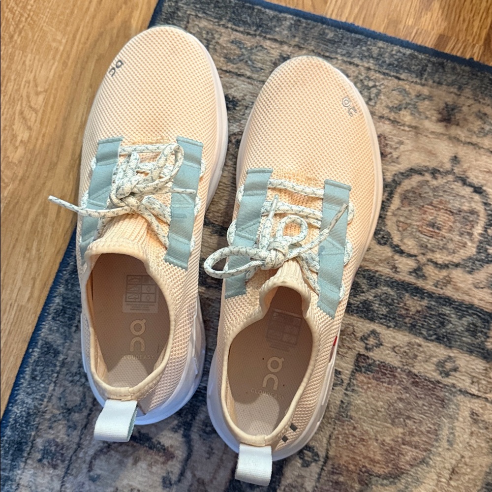 On Running Athletic Shoes in Peach and Light Blue